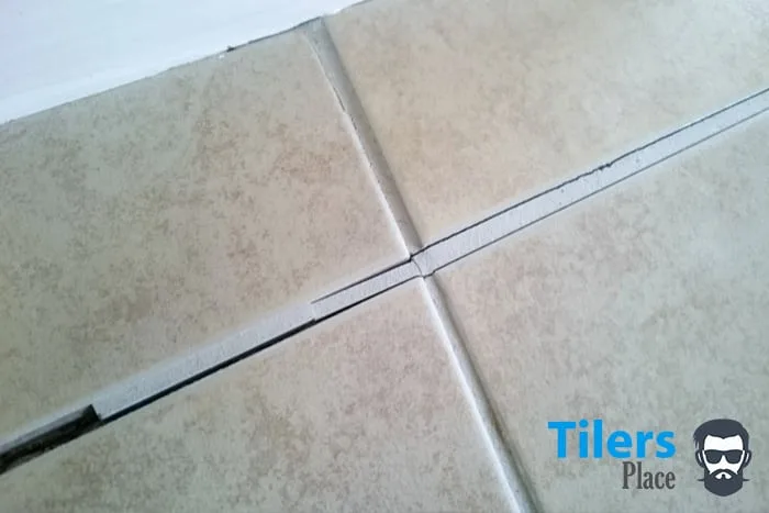 A grout line like this is asking to be replaced. With the right grout remover you can do it easily.