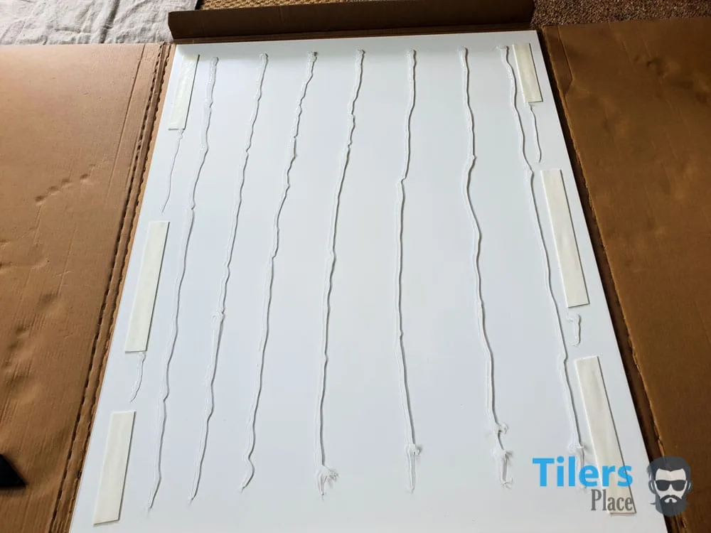 Lay silicone adhesive in 3 inch gaps