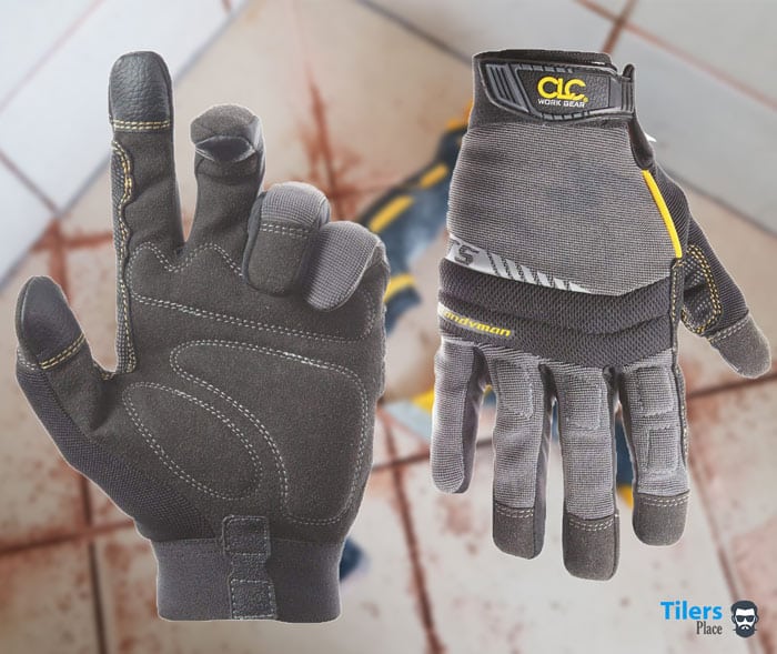 Wearing work gloves is essential for removing grout