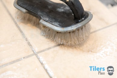 scrubbing grout before sealing