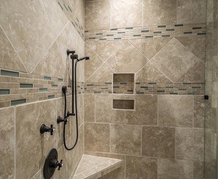 Tiled shower with marble tiles