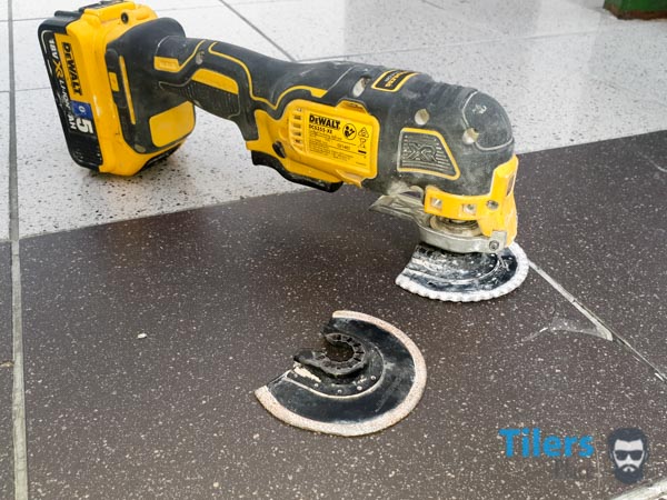 The Dewalt Oscillating multi tool makes tile repair so much easier and I couldn't do it without one.